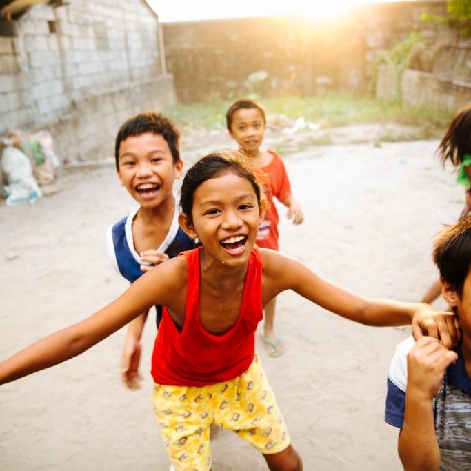 group of children laughing together